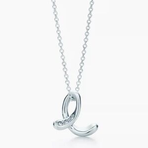 Tiffany & Co. Elsa Peretti  Design “E” Initial necklace in Silver with Diamonds